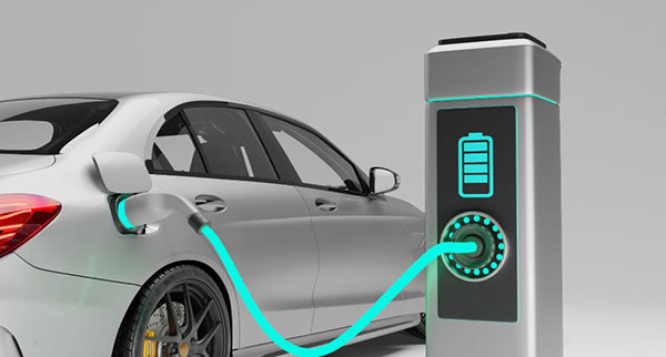 An electric car charging at a public EV station